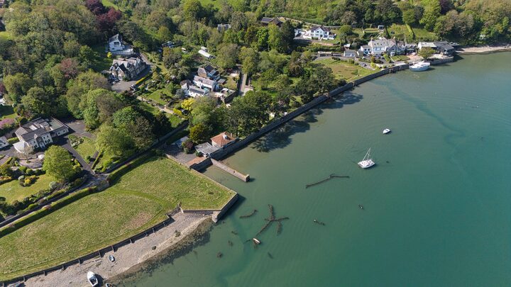 Waterside houses and old moorings
